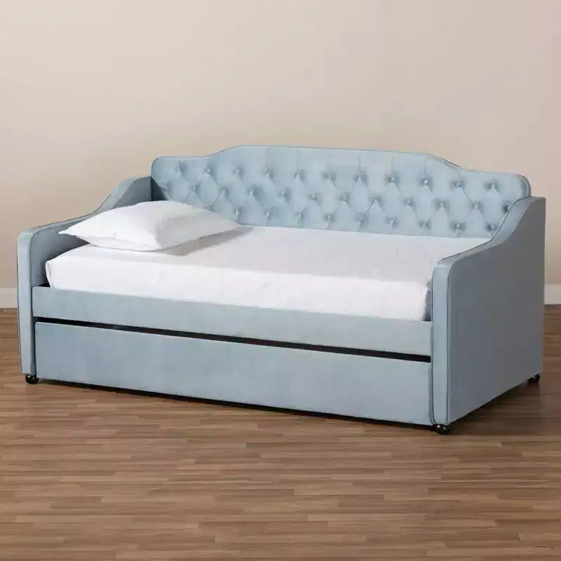Diván tapizado en terciopelo azul claro con cama nido – Capacidad para 2 personas