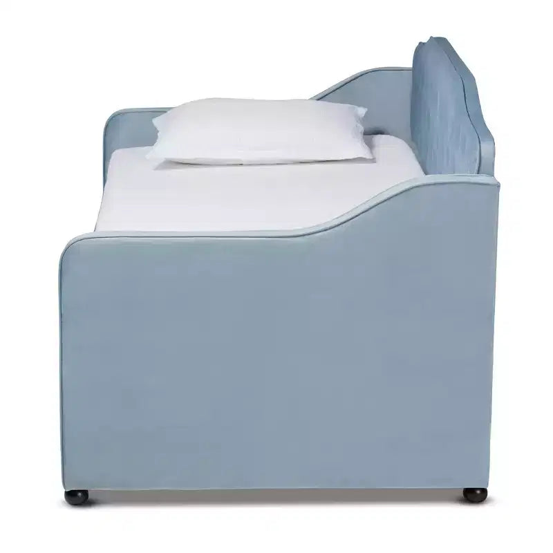 Diván tapizado en terciopelo azul claro con cama nido – Capacidad para 2 personas