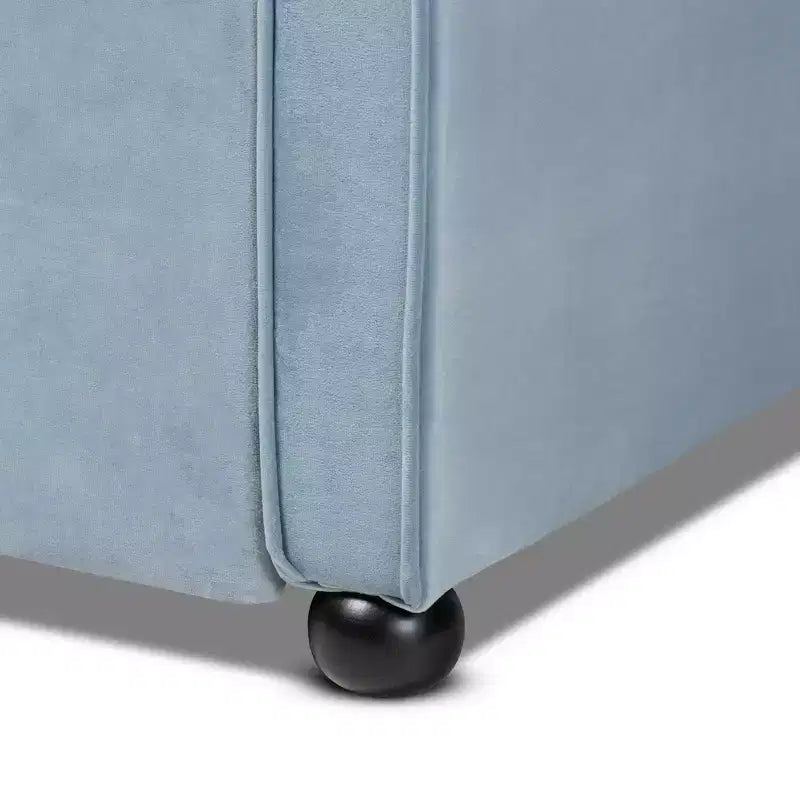 Diván tapizado en terciopelo azul claro con cama nido – Capacidad para 2 personas