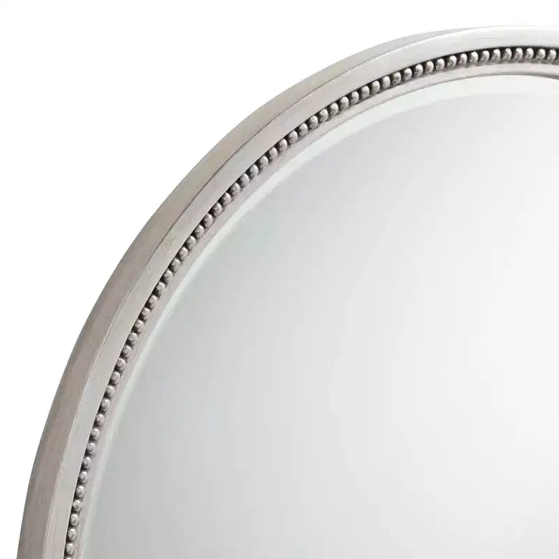 Espejo de pared con borde de cuentas redondas plateadas